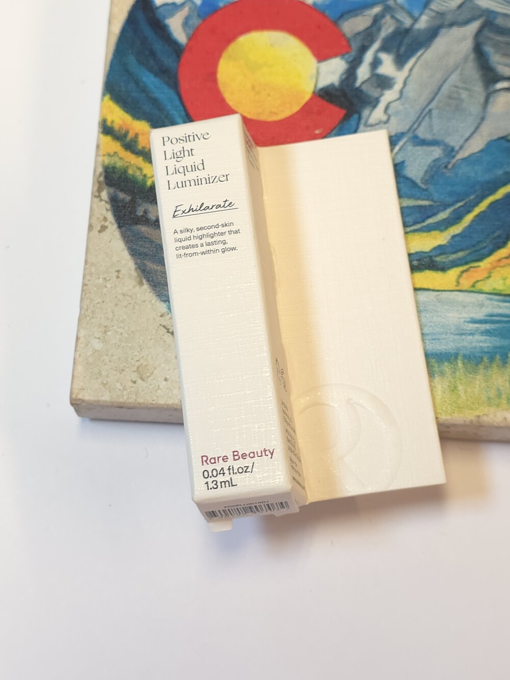 Rare Beauty Positive Light Liquid Luminizer - Exhilarate